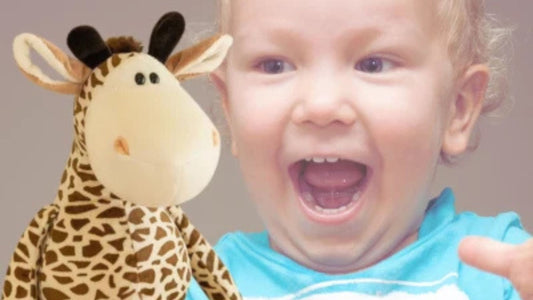 Peluche bébé girafe - La pouponnette