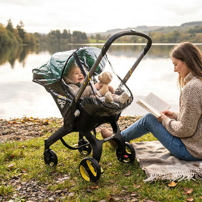 Housse de pluie pour poussette Doona en EVA HD | 3 en 1 – promenade près du lac avec maman