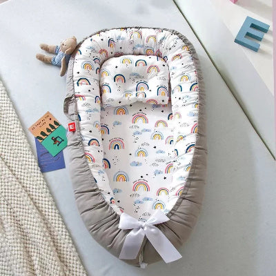 Réducteur de lit - NidPortableBébé™- Arc-En-Ciel