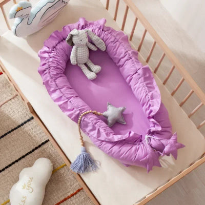 Réducteur de lit bébé - NidD’ange™- Fuchsia