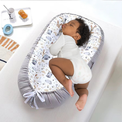 Réducteur de lit bébé - NidPortableBébé™- Sécuritaire