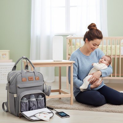 sac a dos a langer gris montrant  compartiments isothermiques